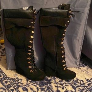 Wedge heeled knee high boots